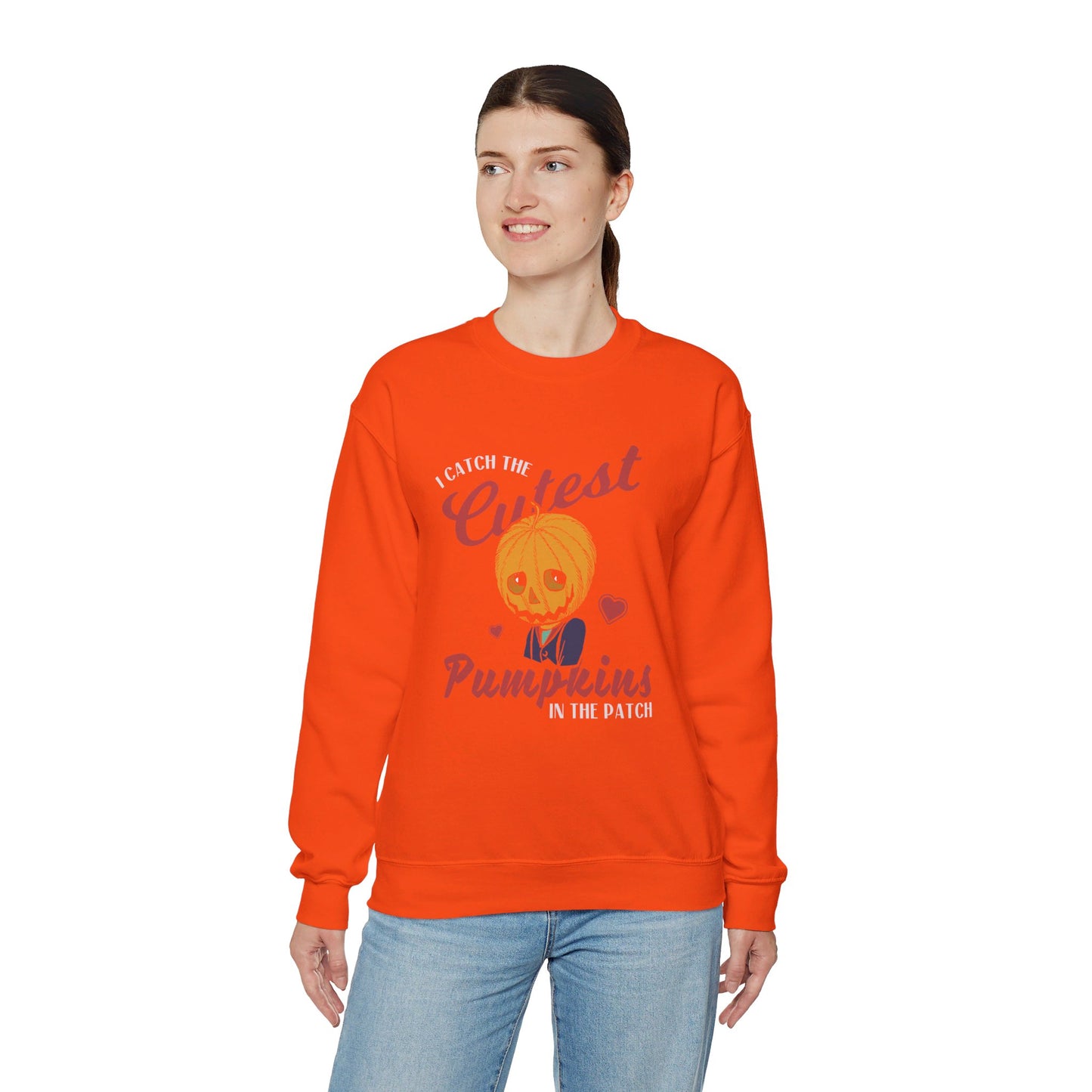 I Catch the Cutest Pumpkins in the Patch Halloween Vibes Crewneck Graphic Sweatshirt in Orange from Topaz Peaks.